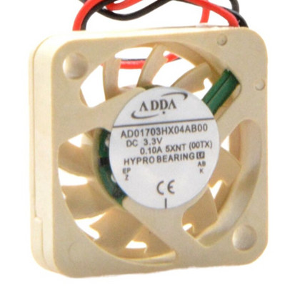 External whole-fan reference: ADDA AD01703HX04AB00 (00TX), labelled DC3.3V 0.10A. Two red/black leads continue beyond the top photograph boundary; their termination is not shown. Source marking 5XNT differs from historical 6YA6; their meaning and supplied-version relationship are unverified. Different unit; supplied condition, measured fit, wiring and pinout require verification.