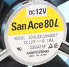 Sanyo Denki 109L0812H4D07 original listing nameplate detail crop, DC12V 0.18A and 020423F marking; native pixels retained. Original full fan photograph with orange connector remains in the gallery.