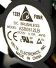 Delta ASB0312LB-AV10 original listing nameplate detail crop, 12V 0.10A F89R and 1322 marking; native pixels retained. Full original fan photograph remains in the gallery.