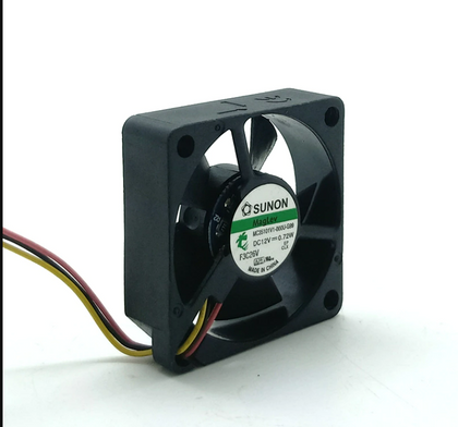 Reference photograph of SUNON MC35101V1-000U-G99, DC12V 0.72W, Made in China, with three visible red/black/yellow lead sections; terminations are not shown. Different unit; supplied version, condition, dimensions and pinout are unverified.